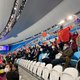 In het schaatsstadion komen de toeschouwers niet voor de races, maar voor de olympische ervaring
