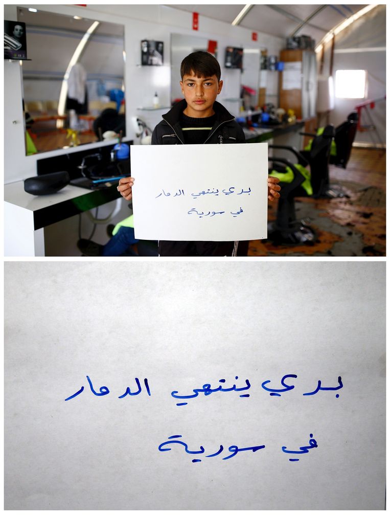 Ik wil dat er een einde komt aan de oorlog in Syrië', schreef Abdullah el-Ohmer (15). Beeld REUTERS