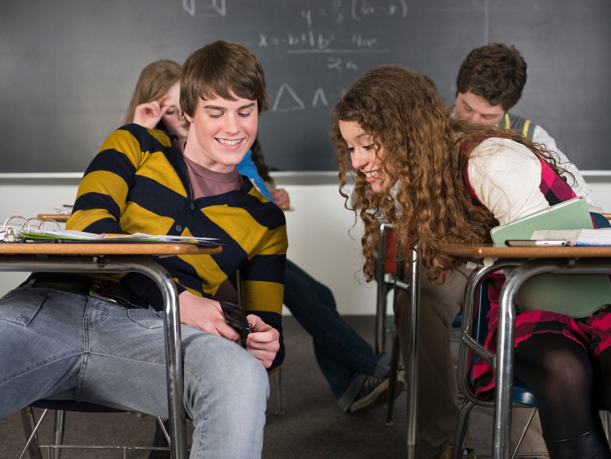 Hope gets naughty in class. Pictures of using cellphones in Classroom. Distraction.