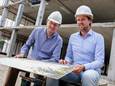 Edward van den Elshout (links) en Bart Atema tijdens de bouw van het Woerdense gemeentehuis.