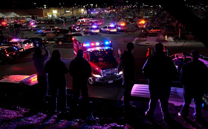 People watch an ambulance leave at the scene of a shooting at a Walmart in Thornton, Colorado November 1, 2017.  REUTERS/Rick Wilking
