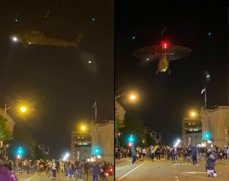 Een helikopter boven de straten van Washington DC. Beeld TWITTER @MARIELCG3 via REUTERS