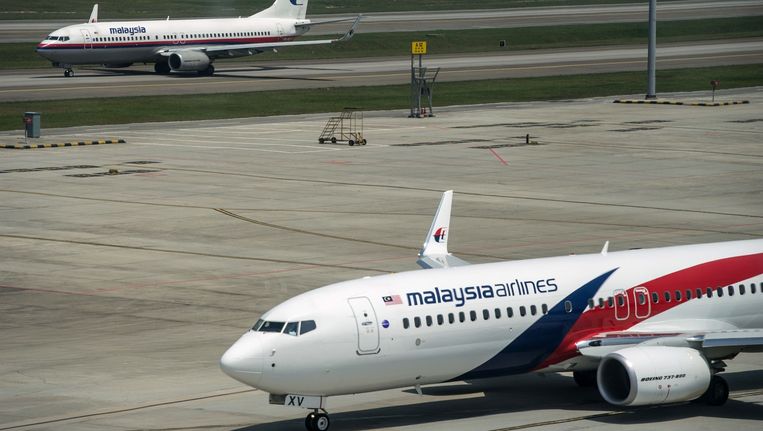 Vliegtuigen van Malaysia Airlines op het vliegveld van Kuala Lumpur. Beeld afp