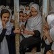 Net niet te oud voor de basisschool voor meisjes in Kandahar, Afghanistan