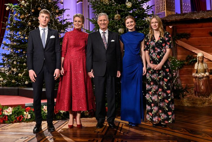 After the ceremony, the royal family stood in front of the palace's Christmas trees.