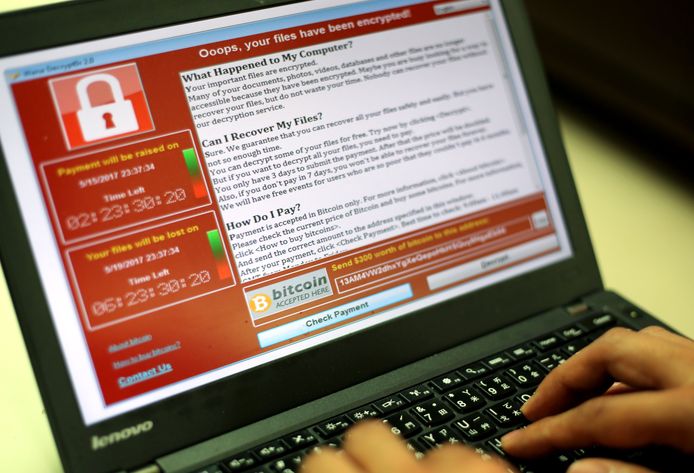 2017-05-13 05:17:21 epa05960674 A programer shows a sample of a ransomware cyberattack on a laptop in Taipei, Taiwan, 13 May, 2017. According to news reports, a 'WannaCry' ransomware cyber attack hits thousands of computers in 99 countries encrypting files from affected computer units and demanding 300 US dollars through bitcoin to decrypt the files.  EPA/RITCHIE B. TONGO