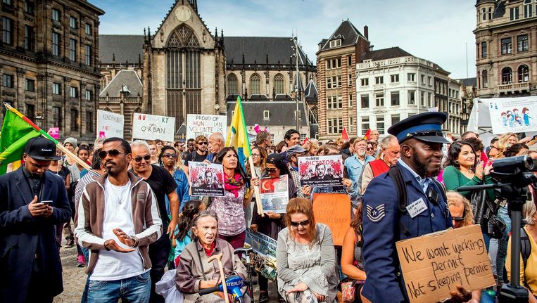 Demonstranten op de Dam in Amsterdam. Beeld anp