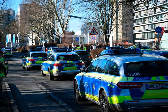 Police cars in front of the university building in Heidelberg.