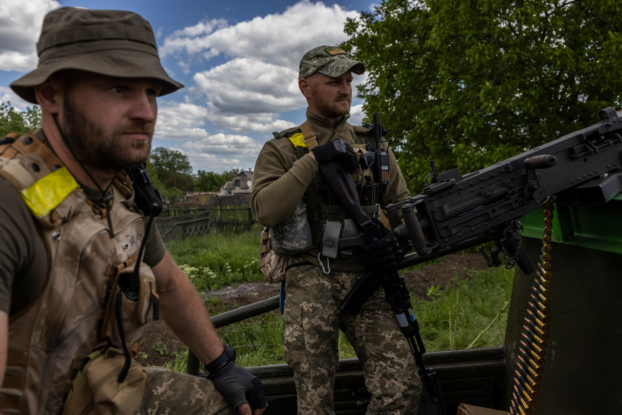 Oekraïense soldaten bij een checkpoint in Donetsk. Beeld NYT