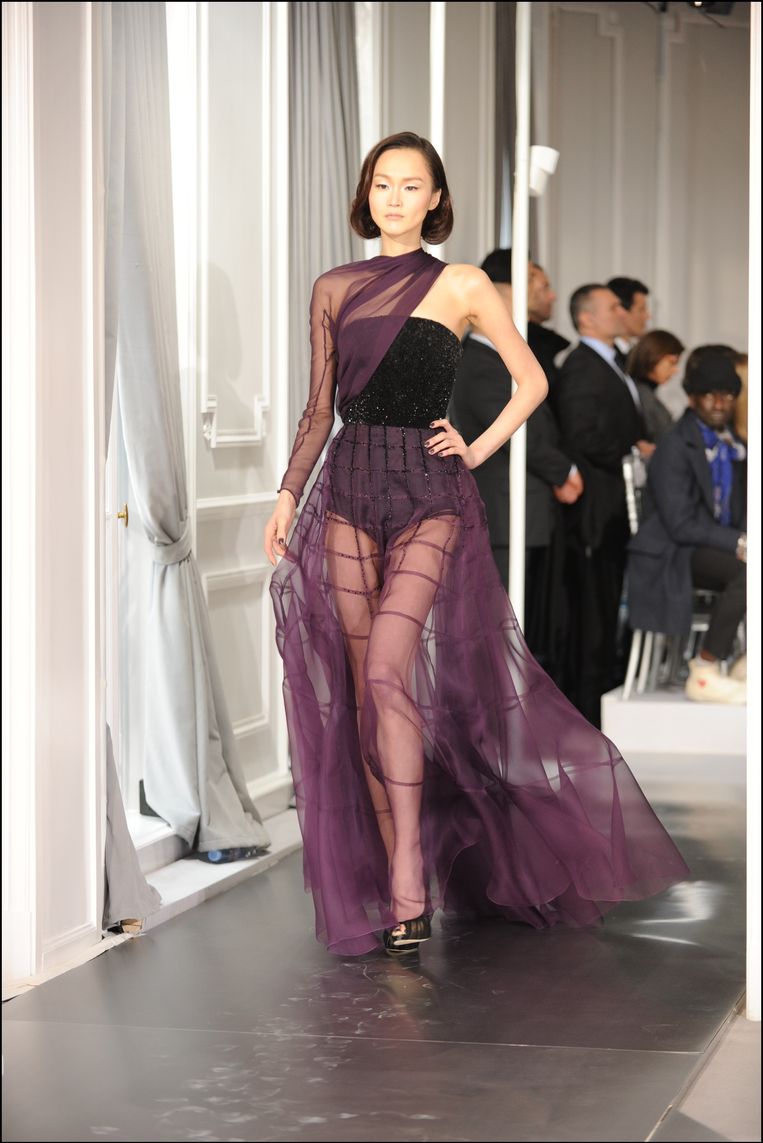Een ontwerp van Dior op de catwalk. Beeld PHOTO_NEWS