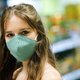 Het mysterie van de virale lading: worden we minder ziek dankzij mondmaskers?