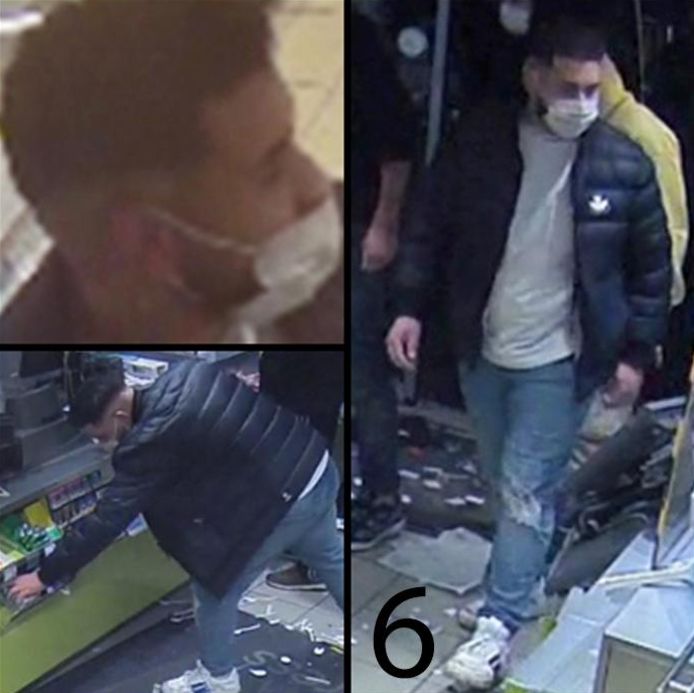 Persoon 6 heeft donker haar dat langs de zijkanten is opgeschoren en een beginnende baard.