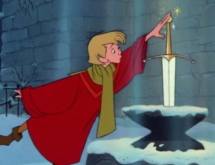 Arthur trekt het zwaard uit de steen.
