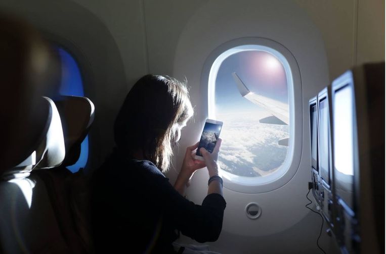 Waarom het slim is om compressiekousen te dragen in het vliegtuig Beeld Getty Images