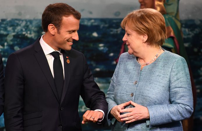 De Franse president Macron en zijn Duitse tegenhanger, bondskanselier Merkel op de G7 afgelopen weekend.