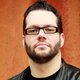 Baard met een mop: Alex Agnew (lang) voor de comeback