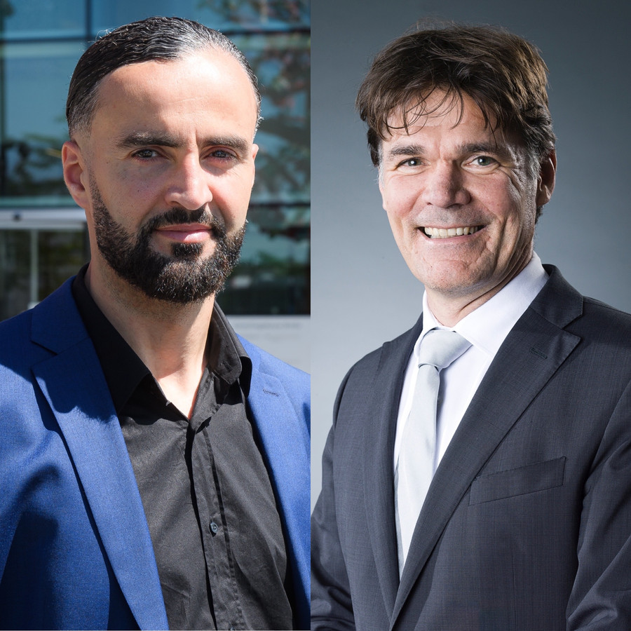 De Bredase burgemeester Paul Depla (rechts) moet jongerenwerker Hassan Lammou een schadevergoeding betalen, omdat hij onterecht schreef dat Lammou een rol speelde bij vuurwerkrellen in Breda-Noord.
