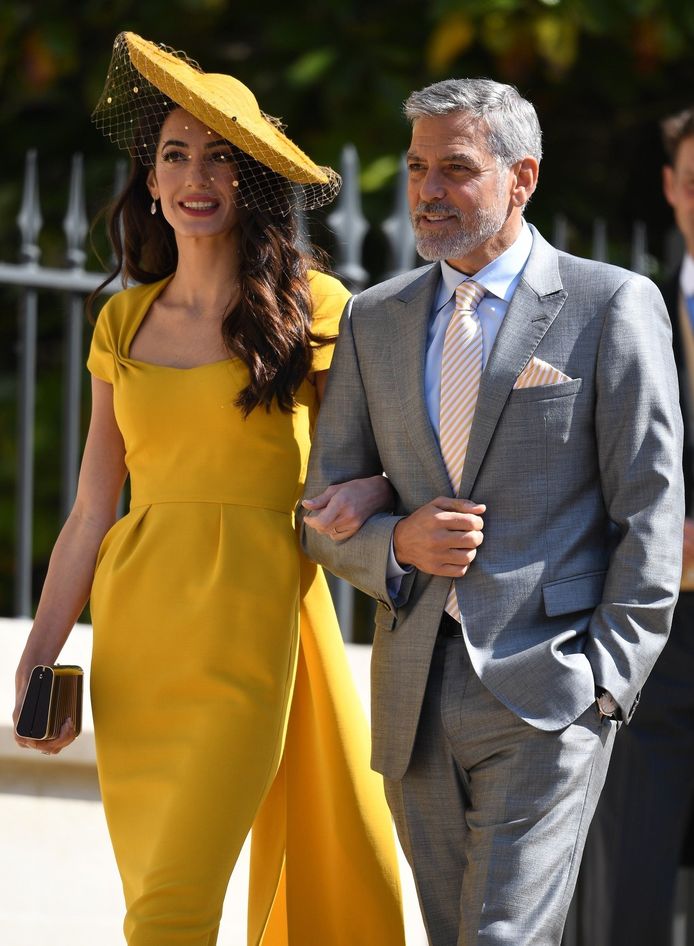 George Clooney en zijn vrouw Amal op het huwelijk van Meghan en Harry.