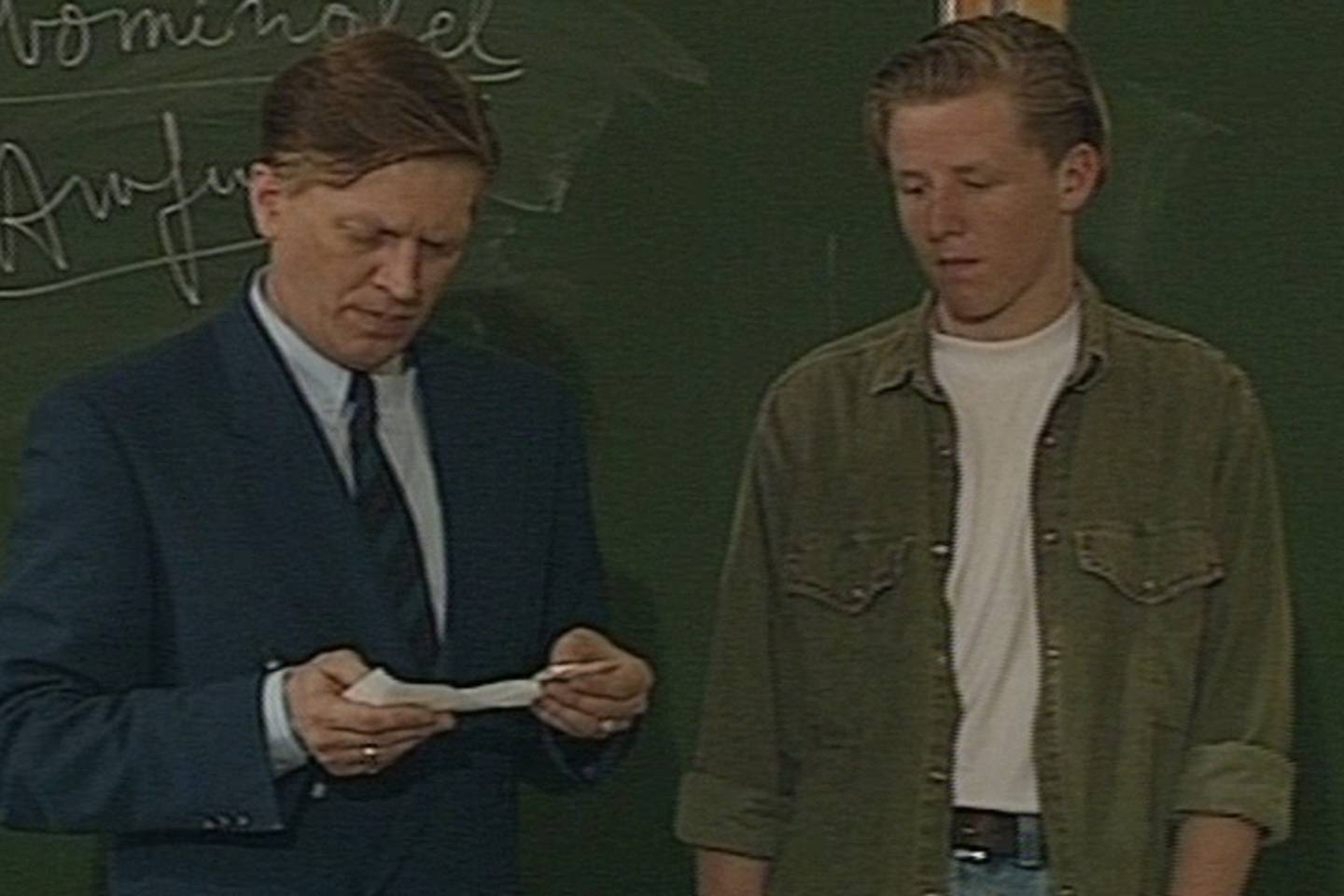 Drie mannen onder een dak
