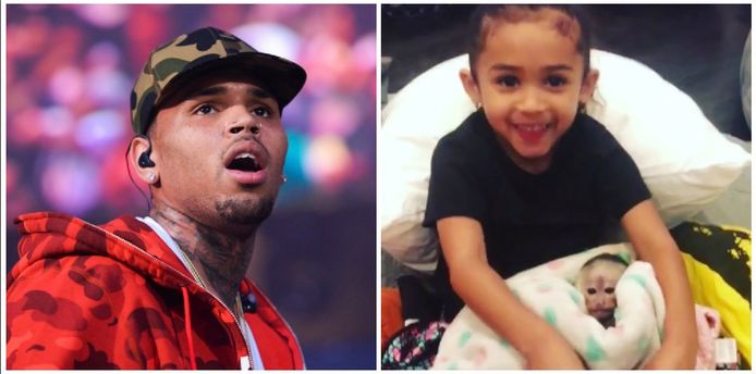 Chris Brown en zijn dochtertje Royalty met het aapje.
