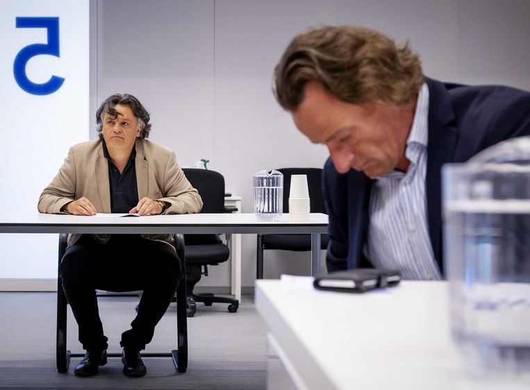 Ab Gietelink (l), bewoner van de Wallen, en voorman Jeroen Pols van actiegroep Viruswaarheid in de rechtbank Beeld ANP