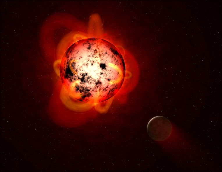Supervlammen op rode dwergsterren kunnen rondcirkelende planeten
steriliseren. Beeld Nasa