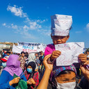 Vrouwen en kinderen demonstreren voor vrede en veiligheid. Foto Naqib Rasoli, ReFOCUS Media Labs