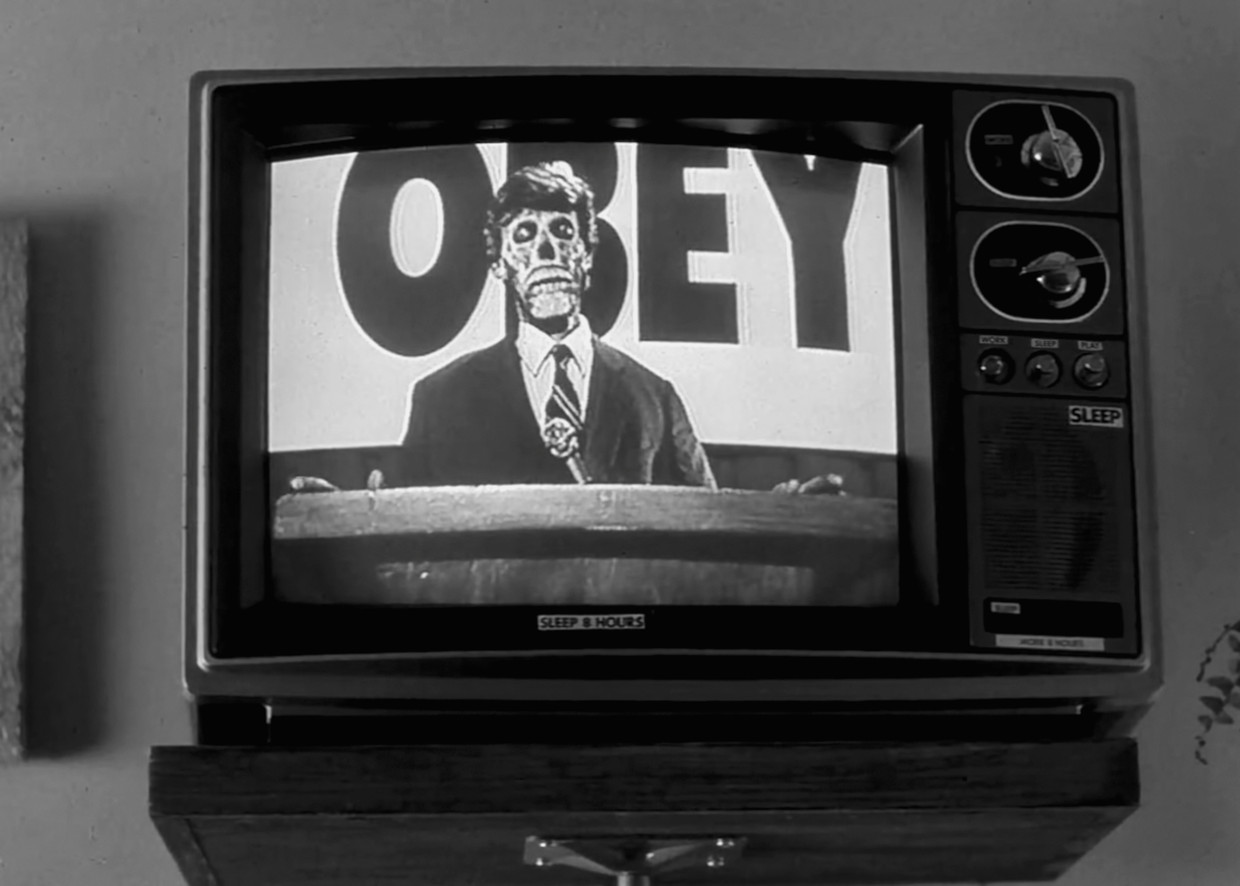 De ontmaskerde president spreekt in They Live (1988) van John Carpenter. Beeld Alamy Stock Photo