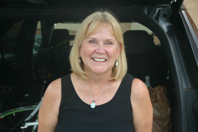 Kathy Ranft (63), inwoner van de 'gated community' Highclere en samen met haar man eigenaar van een aantal MacDonald's restaurants. 'Wat Trump zegt is enorm belangrijk. Hij probeert Amerika te houden zoals wij erin zijn opgegroeid'.  Beeld Michael Persson