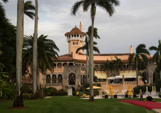 (FILES) In this file photo taken on December 30, 2016 workers lay out the red carpet at Mar-a-Lago Club in Palm Beach, Florida. - Former president Donald Trump's Florida resort Mar-a-Lago has been partially closed after some members of staff tested positive for the coronavirus, US media reported on March 19, 2021. (Photo by Don EMMERT / AFP)