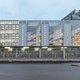 Gele roltrappen, weinig kleur en transparantie: zo vernieuwde OMA het voormalig VROM-gebouw