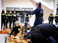 In totaal 13 actievoerders opgepakt bij Amsterdamse stadhuis