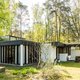 Deze twee filmmakers wonen in een unieke villa vol ingenieuze vondsten in 007-stijl, verscholen in het groen in Mechelen