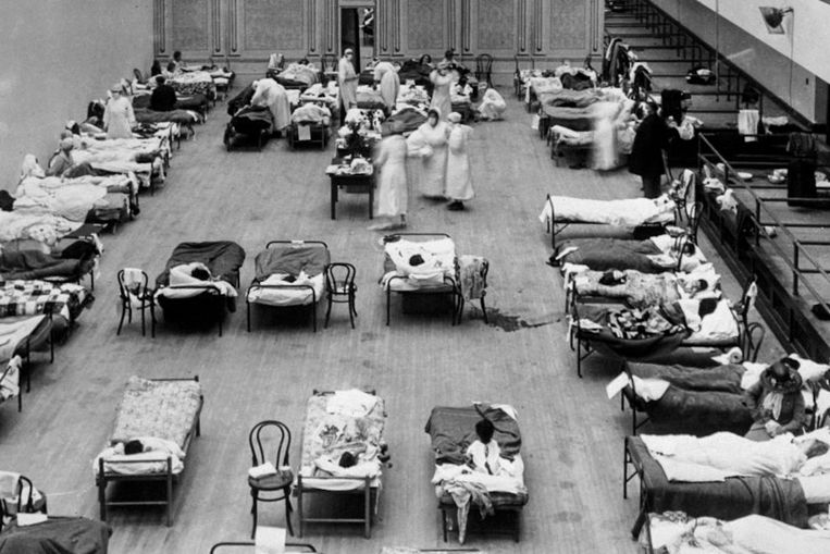 Sisters of the American Red Cross take care of the victims of the flu epidemic (1918).  Image rawpixel.com