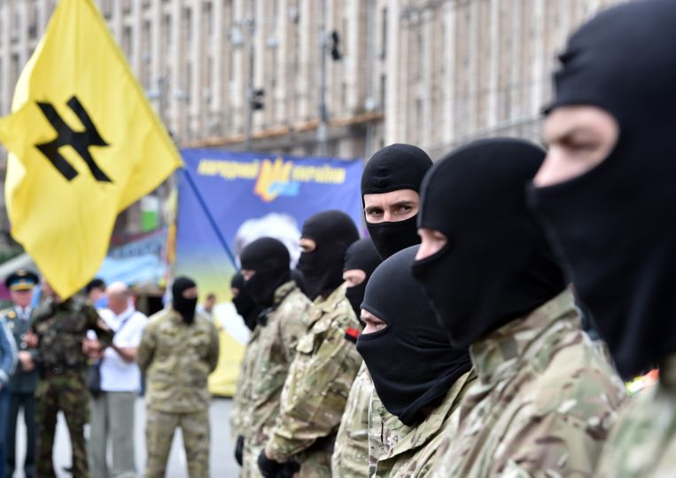 Nationaalsocialistische militantanten van SNA, een onderdeel van de Oekraïense Right Sector partij. Beeld AFP