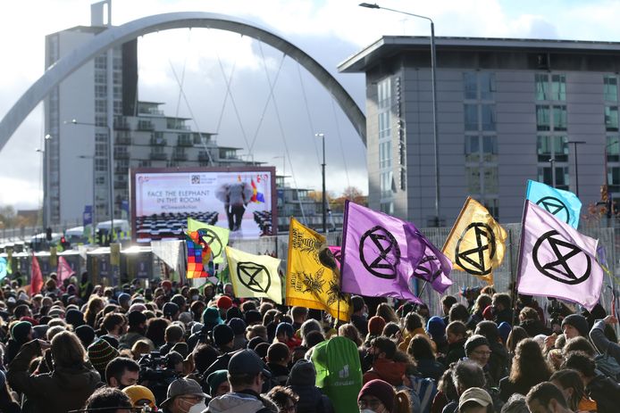 Een betoging aan de klimaattop in Glasgow.