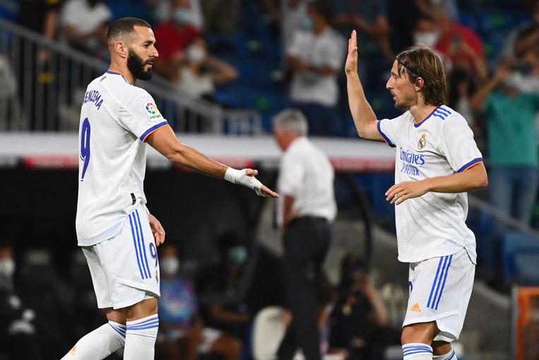 De klasse en ervaring van Karim Benzema (links) en Luka Modric komt in de Champions League bovendrijven. Beeld AFP