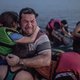 Huilende vader met kinderen in Duitsland aangekomen: "Merkel is als een moeder"