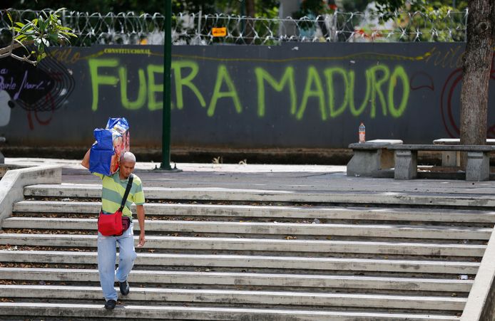 Graffiti in hoofdstad Caracas: “Scheer je weg Maduro”.