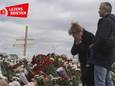 Russen leggen bloemen in Moskou op de plek van de aanslag van afgelopen vrijdag.