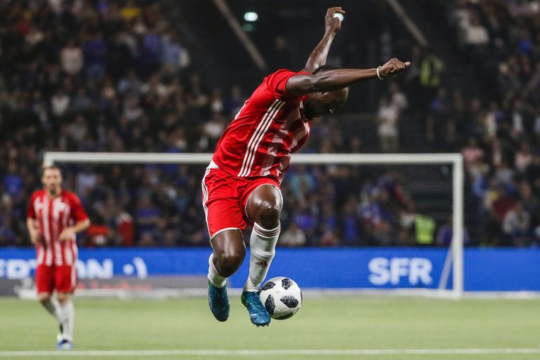 Usain Bolt tijdens een  demo-wedstrijd. Beeld AFP