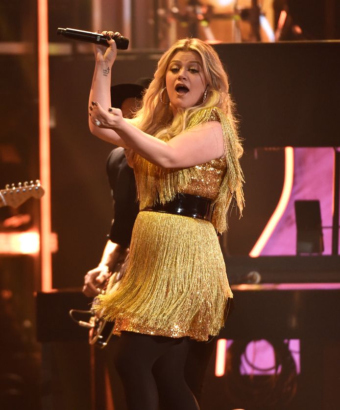 Presentatrice Kelly Clarkson zingt "Whole Lotta Woman" tijdens de Billboard Music Awards zondag 20 mei 2018 in Las Vegas. (Photo by Chris Pizzello/Invision/AP)