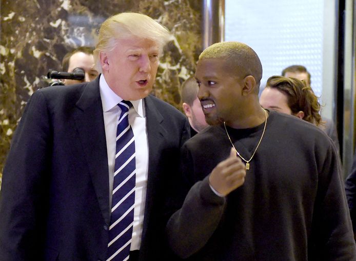 Archiefbeeld. President Donald Trump en rapper Kanye West tijdens een ontmoeting in december 2016.