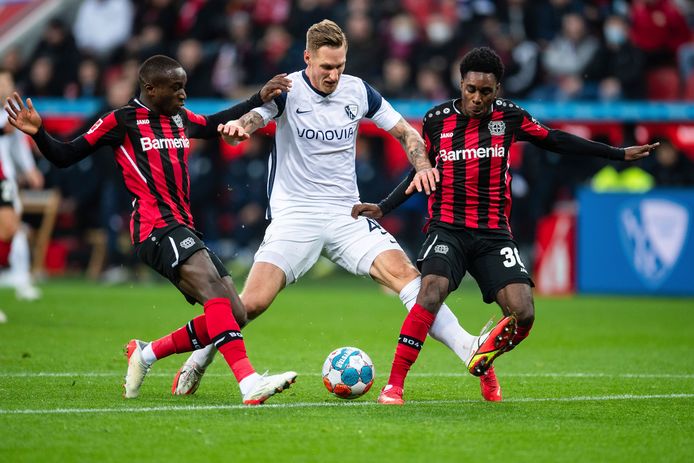 Jeremie Frimpong (right) tries to stop his opponent.