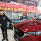 Het is rustig in de Chinese autoshowrooms, te rustig