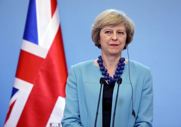 Britse premier Theresa May tijdens een persconferentie over de gevolgen van Brexit. Beeld EPA