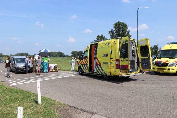 Botsing fietser en automobilist.