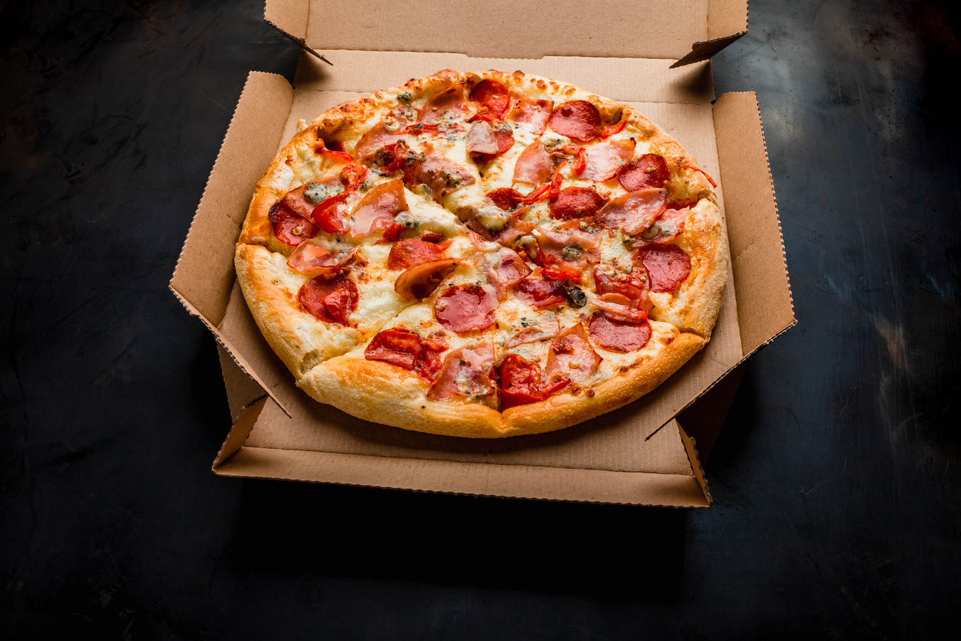 Adviesbureau Involve laat pizza bezorgen bij alle collega's om de maandelijkse lunch alsnog voort te zetten
