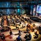 Opinie: Wetenschappers, het is niet van deze tijd de wereld over te vliegen voor ieder congres
