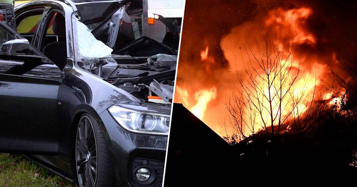 KIJK: Dubbel ongeluk op ‘horrorkruising’ • Vlammen slaan metershoog uit deze schuur.